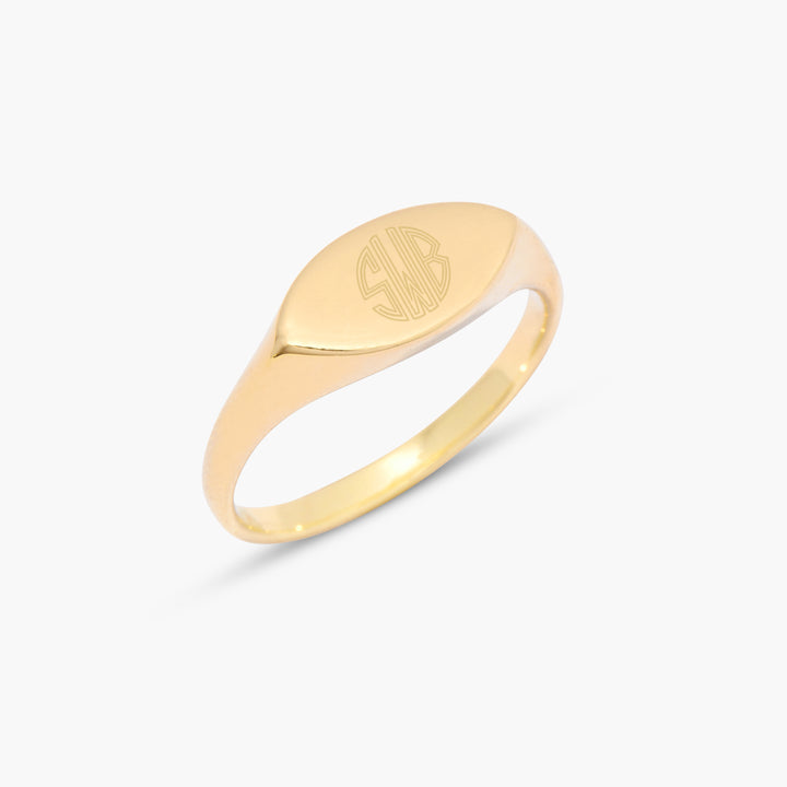 Gold-tone Evelyn Signet Ring with an oval face engraved with three block-letter monogram initials in a classic interlocking style.